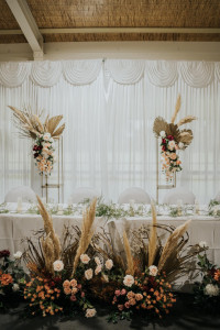 Bride and groom table arrangements