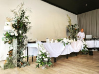 Bride and groom table arrangements